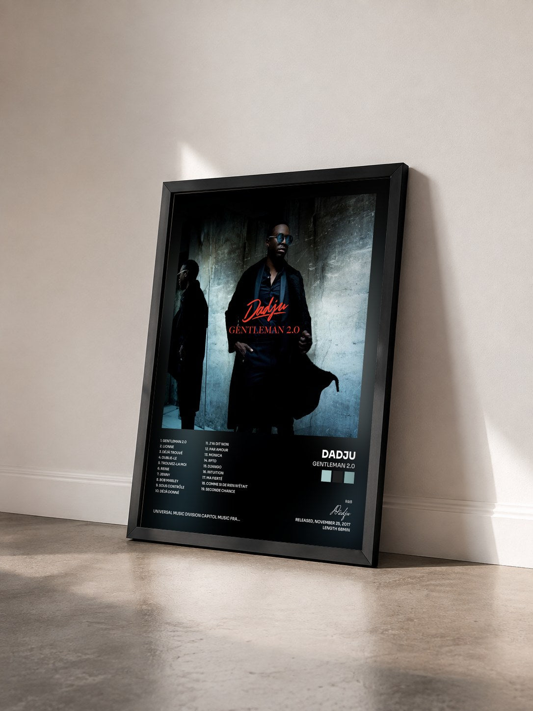 #noir Tableau de l'album Gentleman 2.0 de Dadju vu de trois quarts, cadre noir