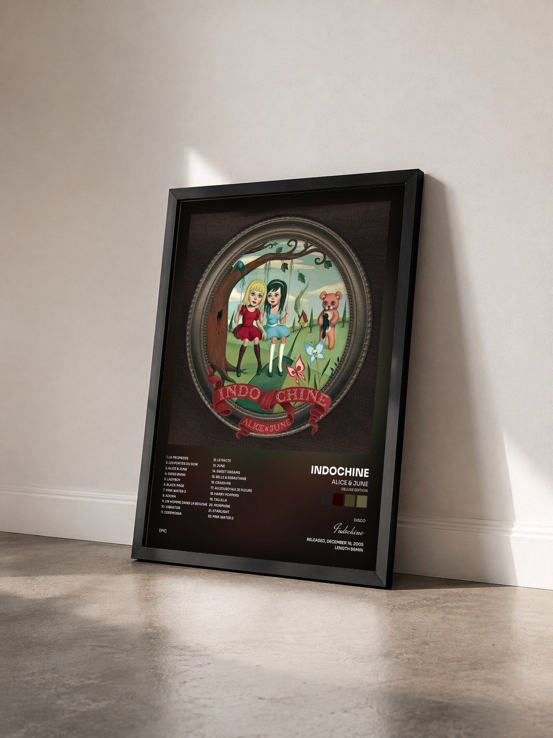 #noir Alice & June (deluxe edition) by Indochine as a framed art print seen at an angle, black frame