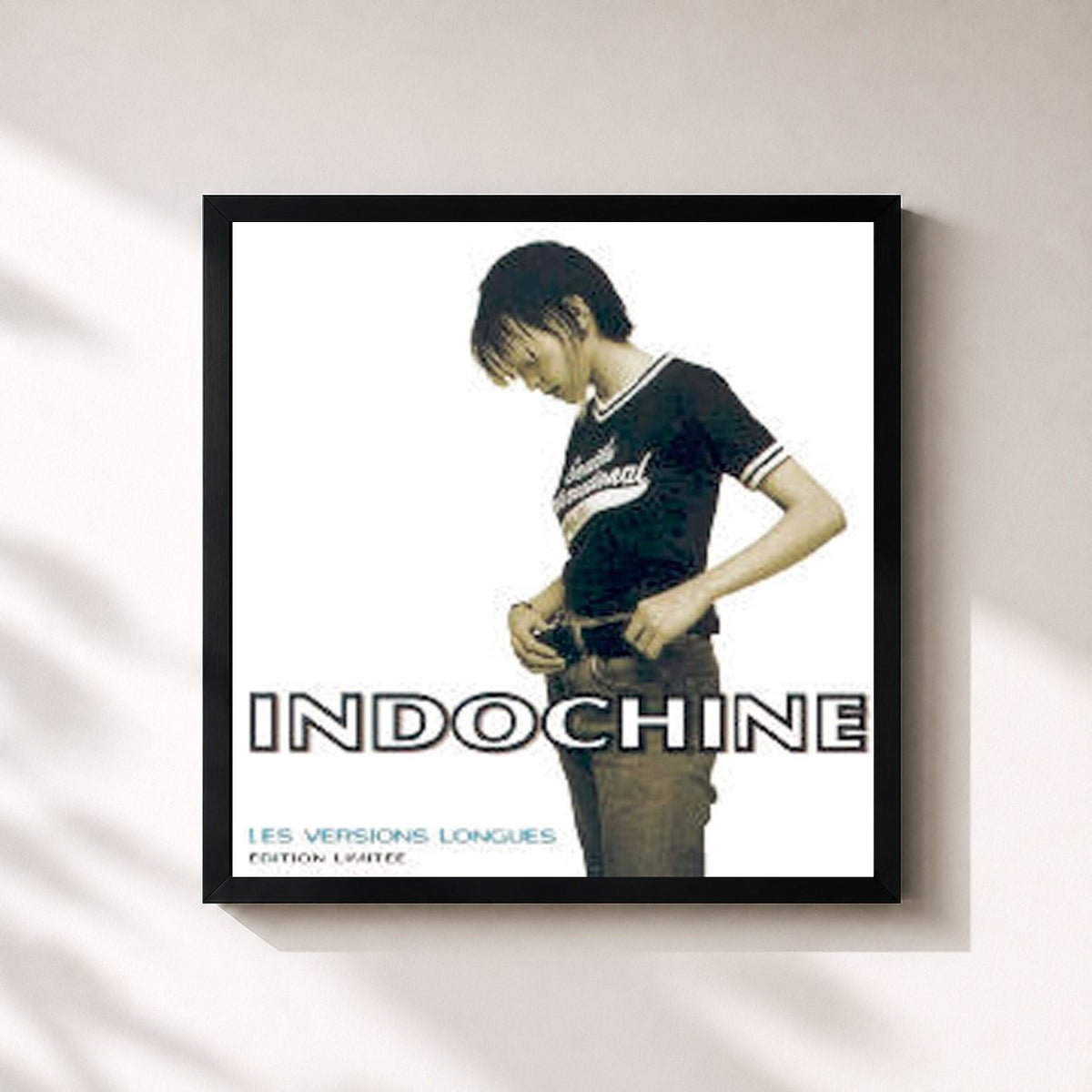 #noir Unita - Les Maxis by Indochine as a square framed art print, black 32x32 cm frame
