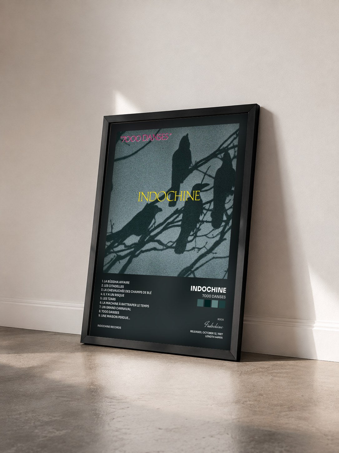 #noir 7000 danses by Indochine as a framed art print seen at an angle, black frame