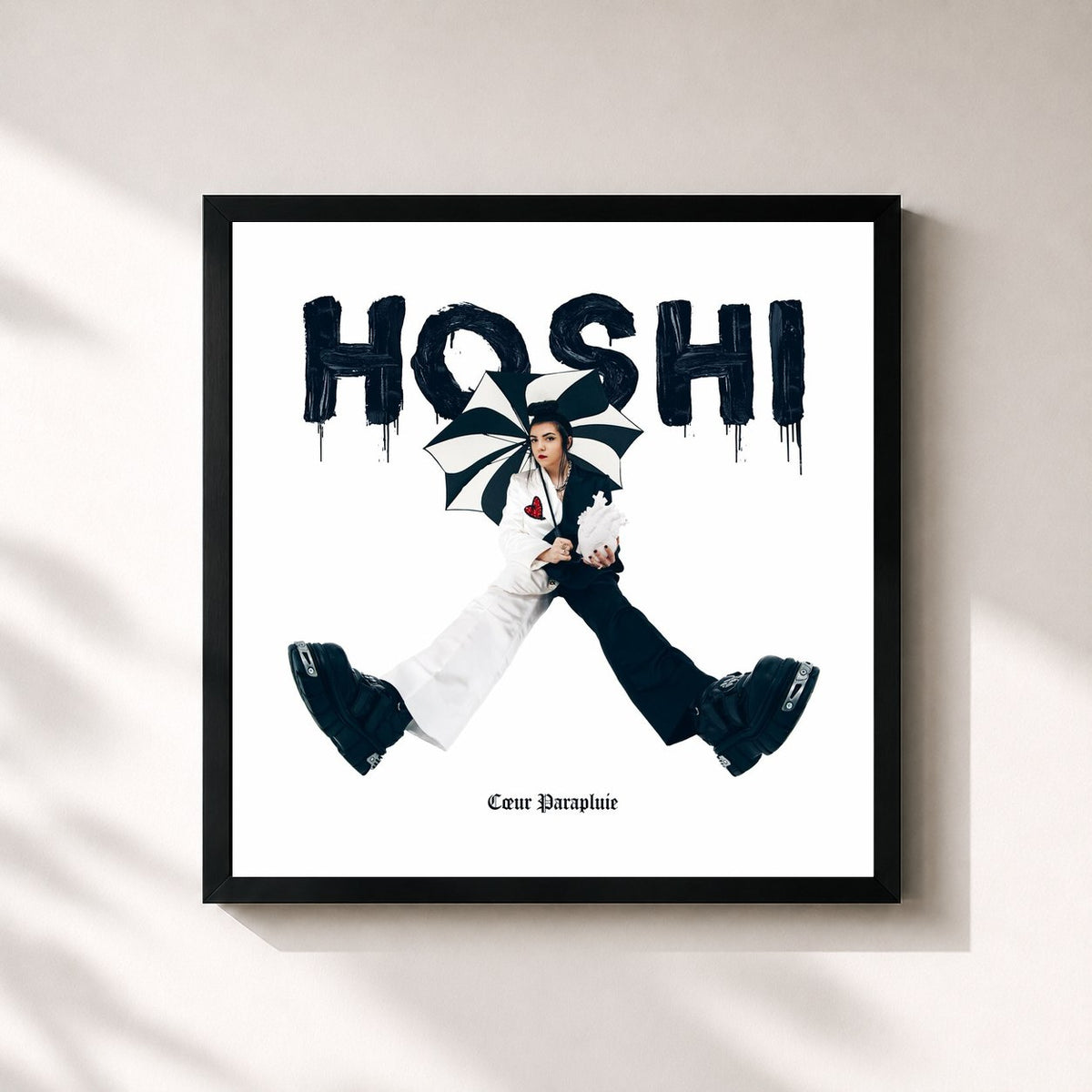 #noir Tableau carré de l'album Cœur parapluie de Hoshi, cadre noir 32x32 cm