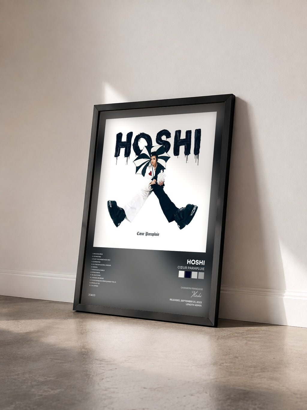 #noir Tableau de l'album Cœur parapluie de Hoshi vu de trois quarts, cadre noir