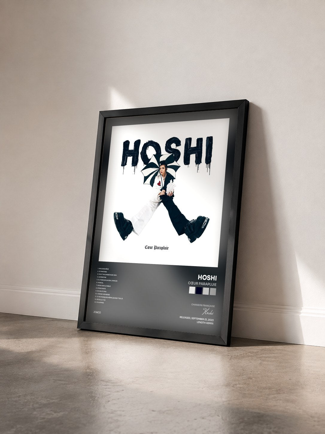 #noir Tableau de l'album Cœur parapluie de Hoshi vu de trois quarts, cadre noir