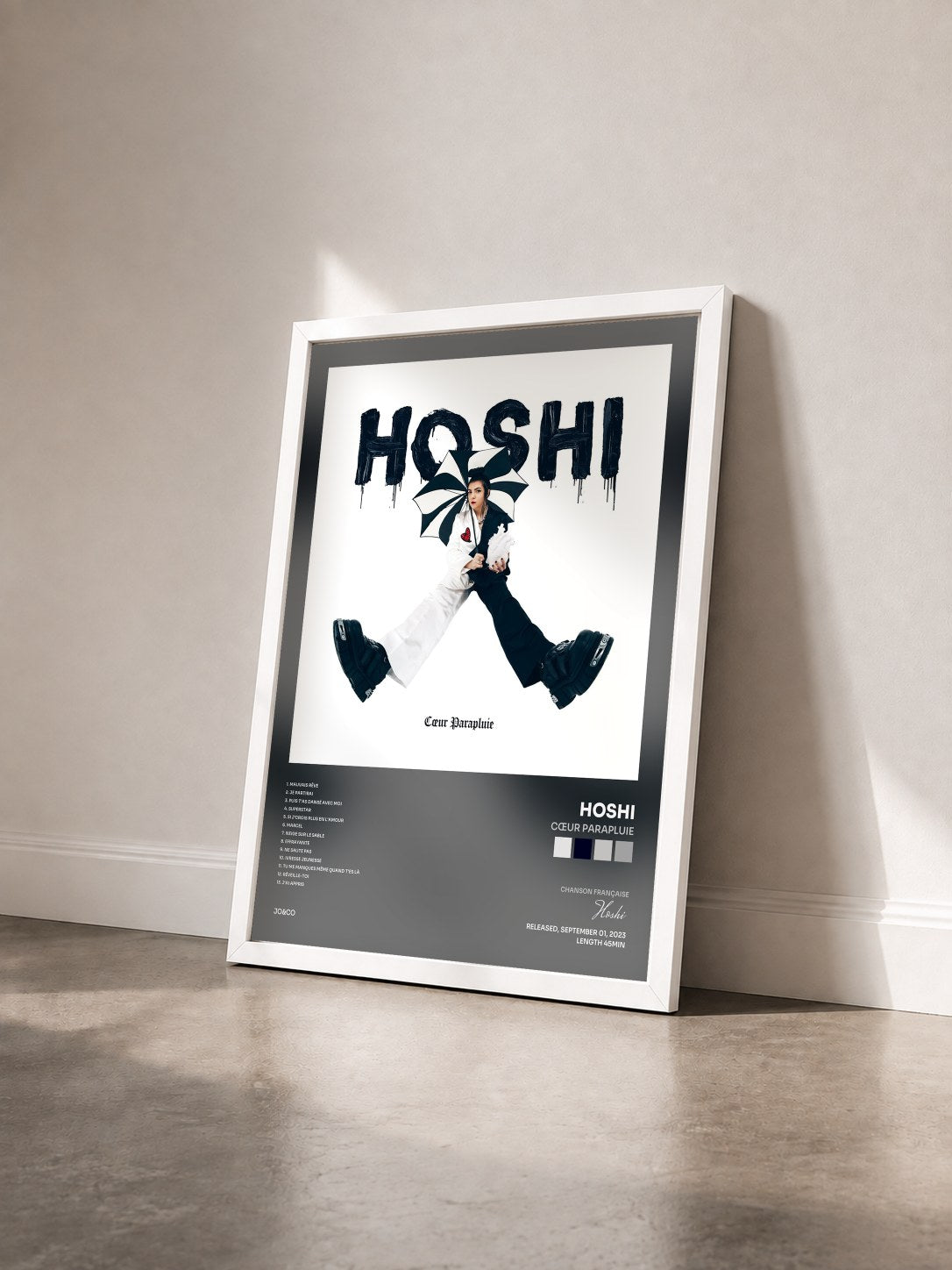 #blanc Tableau de l'album Cœur parapluie de Hoshi vu de trois quarts, cadre blanc