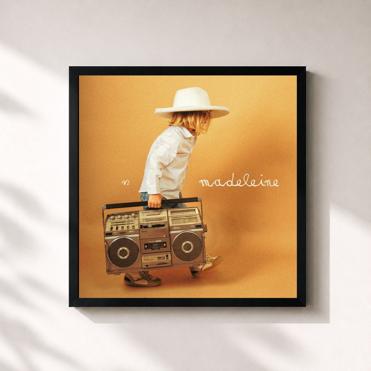 #noir Madeleine de Yann Muller en lámina cuadrada enmarcada, marco negro de 32x32 cm