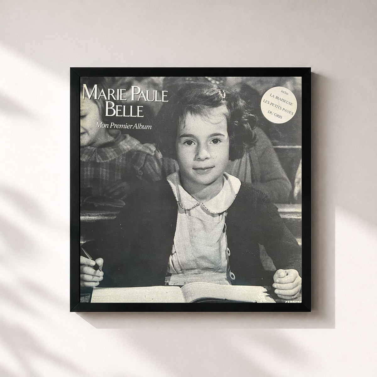#noir Mon premier album by Marie-Paule Belle as a square framed art print, black 32x32 cm frame