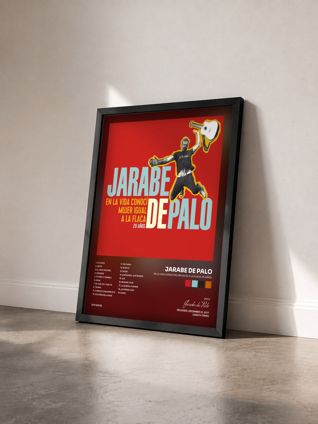 #noir Tableau de l'album En la vida conocí mujer igual a la Flaca: 20 años de Jarabe de Palo vu de trois quarts, cadre noir