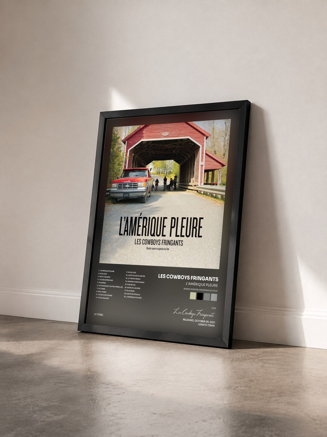 #noir Tableau de l'album L'Amérique pleure (Bande sonore originale du film) de Les Cowboys Fringants vu de trois quarts, cadre noir