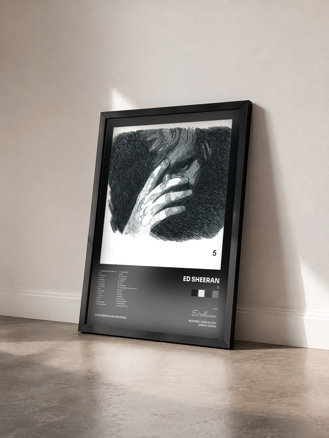 #noir Tableau de l'album 5 de Ed Sheeran vu de trois quarts, cadre noir