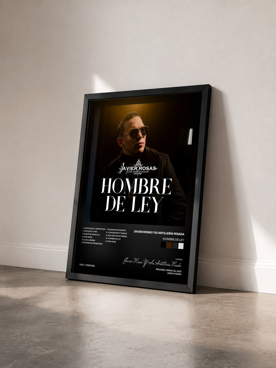 #noir Tableau de l'album Hombre De Ley de Javier Rosas Y Su Artillería Pesada vu de trois quarts, cadre noir