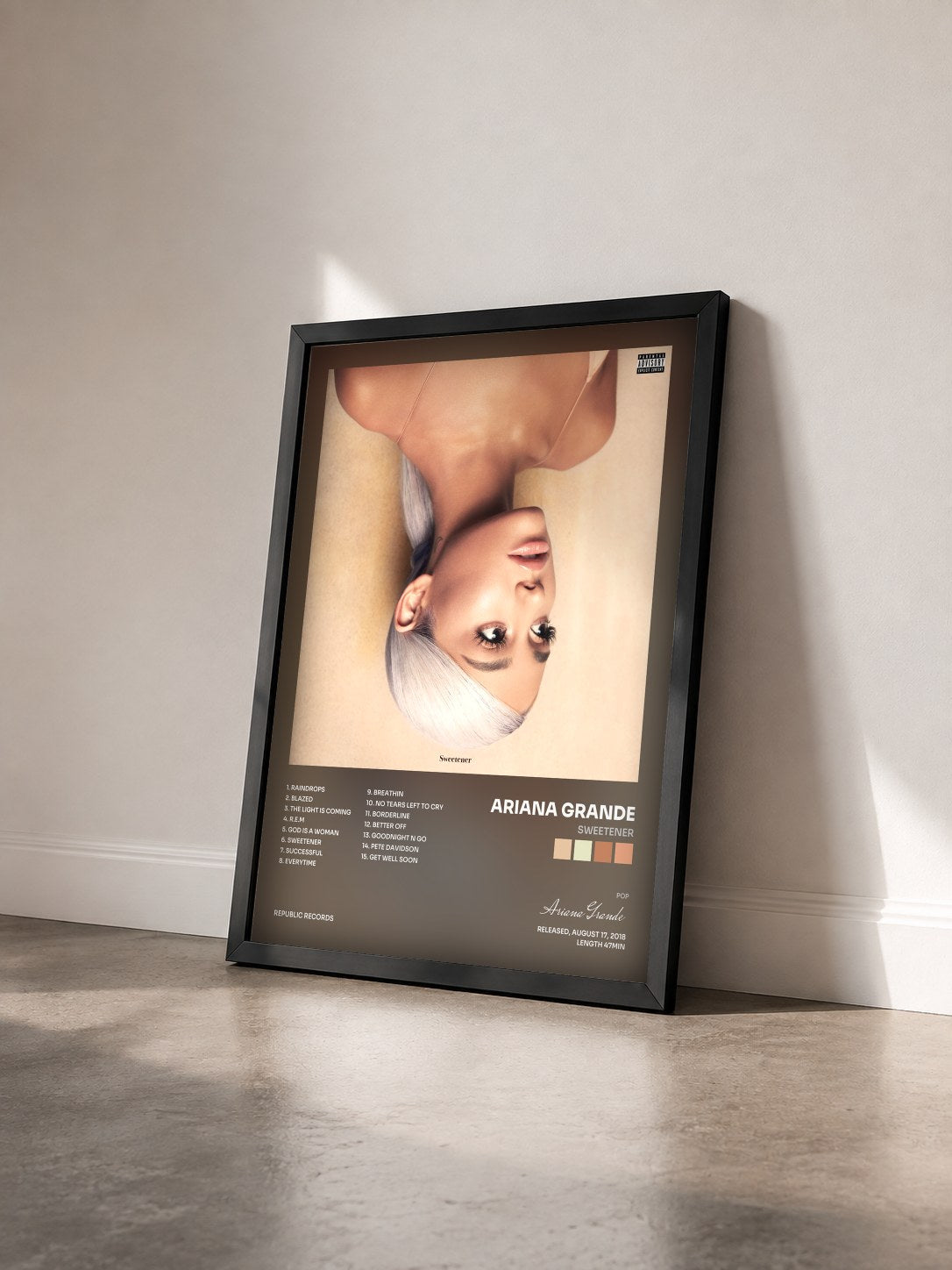 #noir Sweetener by Ariana Grande as a framed art print seen at an angle, black frame