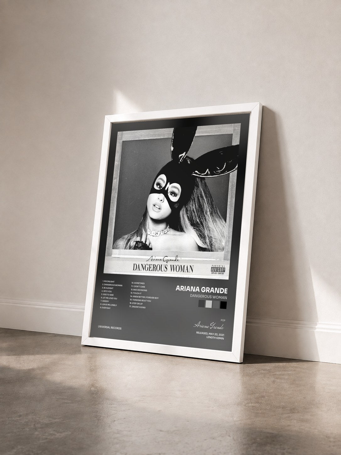 #blanc Dangerous Woman by Ariana Grande as a framed art print seen at an angle, white frame