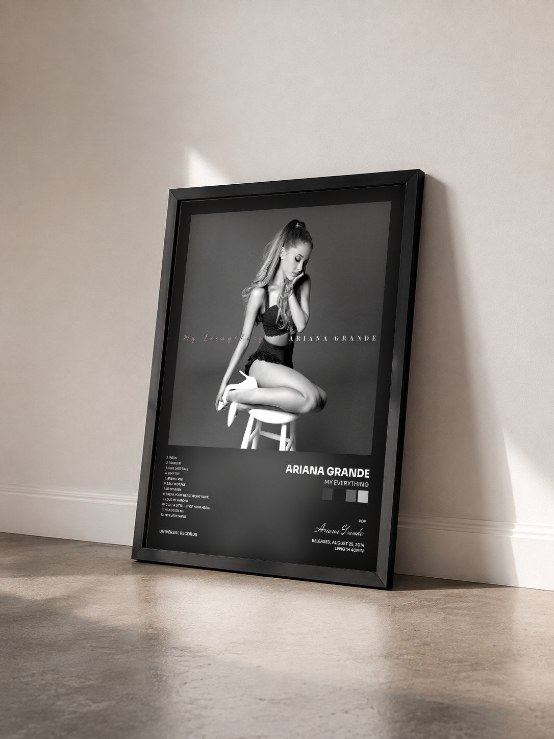 #noir My Everything by Ariana Grande as a framed art print seen at an angle, black frame