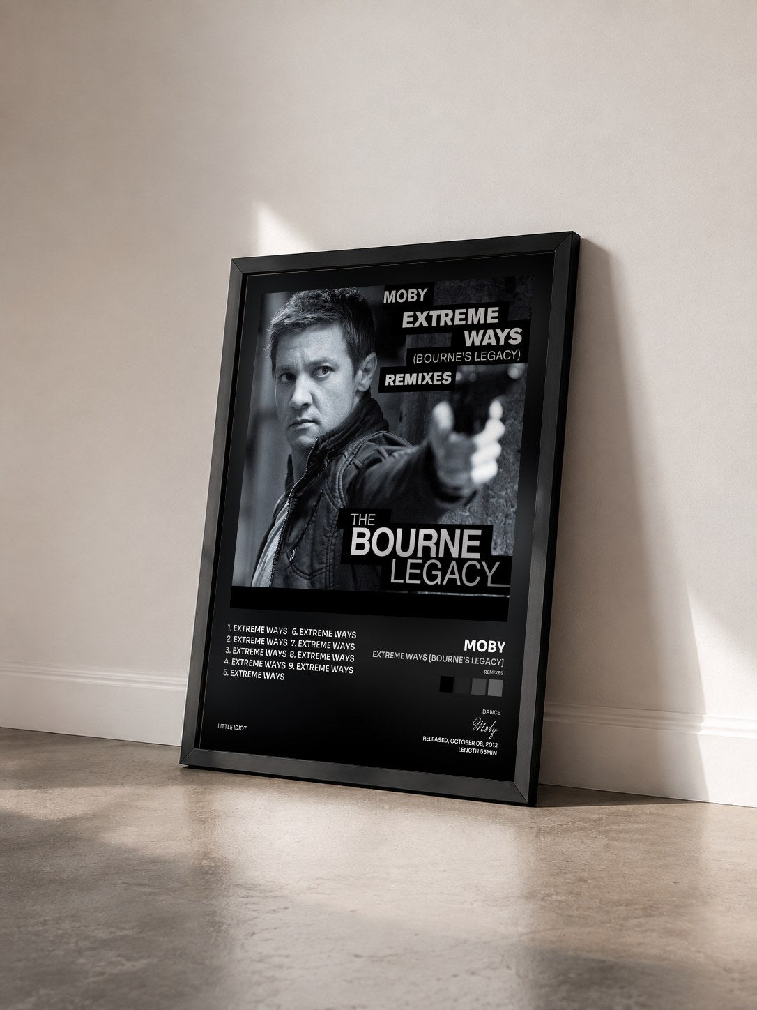 #noir Tableau de l'album Extreme Ways (Bourne's Legacy) (Remixes) de Moby vu de trois quarts, cadre noir