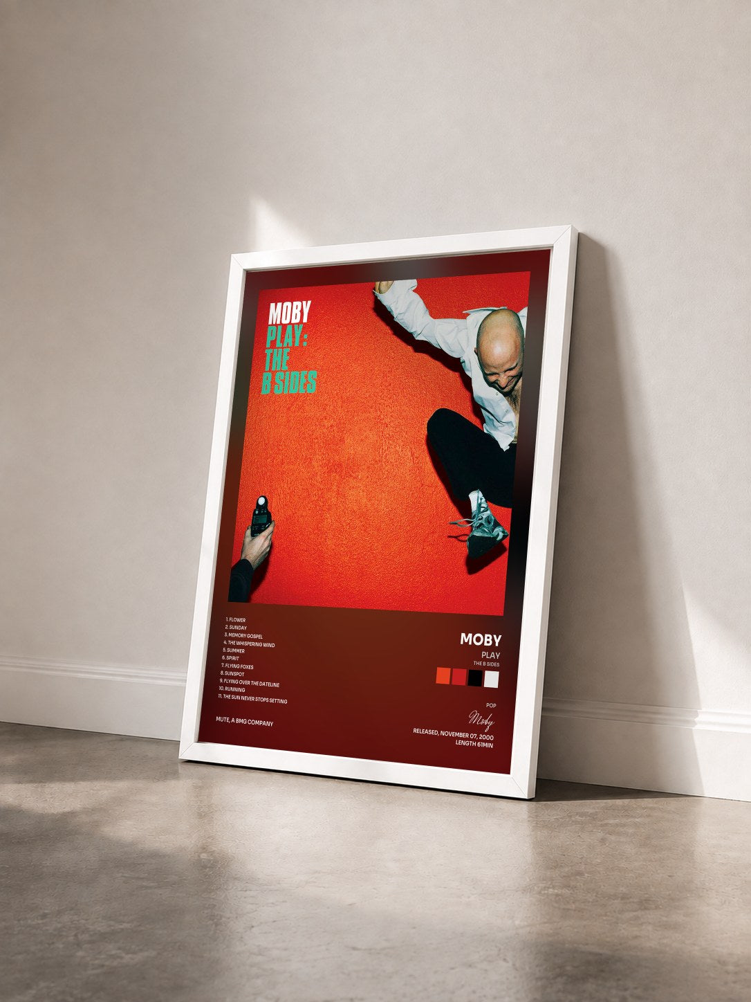 #blanc Tableau de l'album Play (The B Sides) de Moby vu de trois quarts, cadre blanc