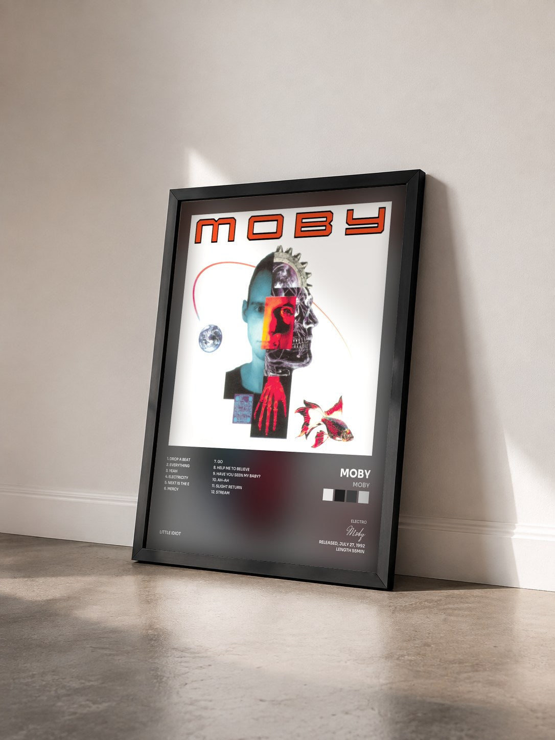 #noir Tableau de l'album Moby de Moby vu de trois quarts, cadre noir