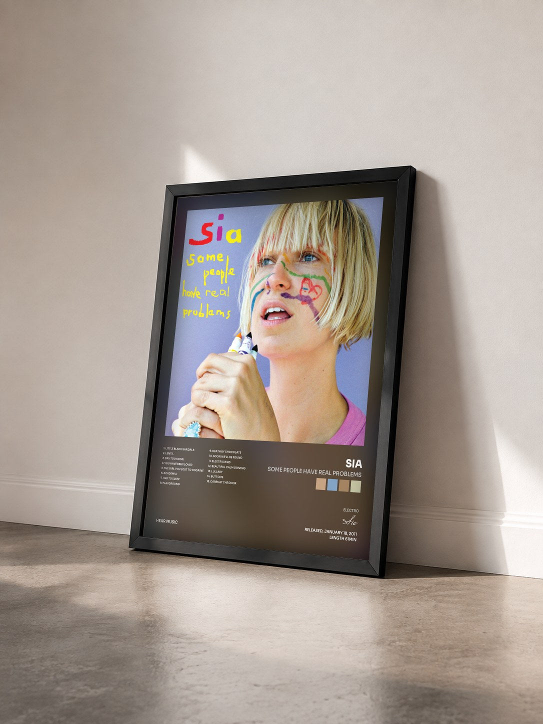 #noir Tableau de l'album Some People Have REAL Problems de Sia vu de trois quarts, cadre noir