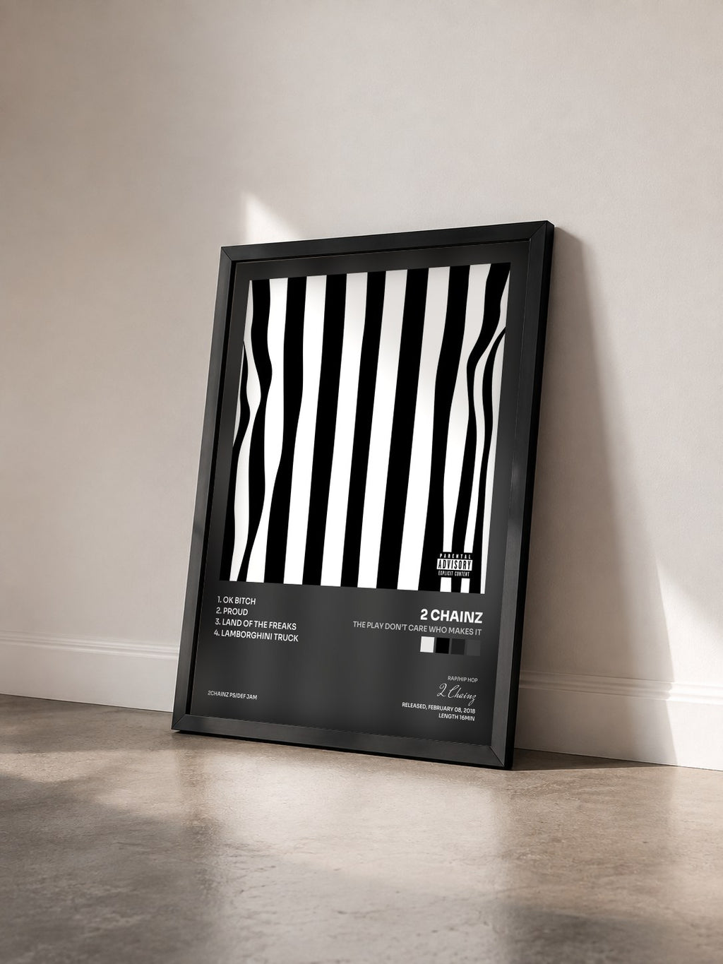 #noir Tableau de l'album The Play Don’t Care Who Makes It de 2 Chainz vu de trois quarts, cadre noir