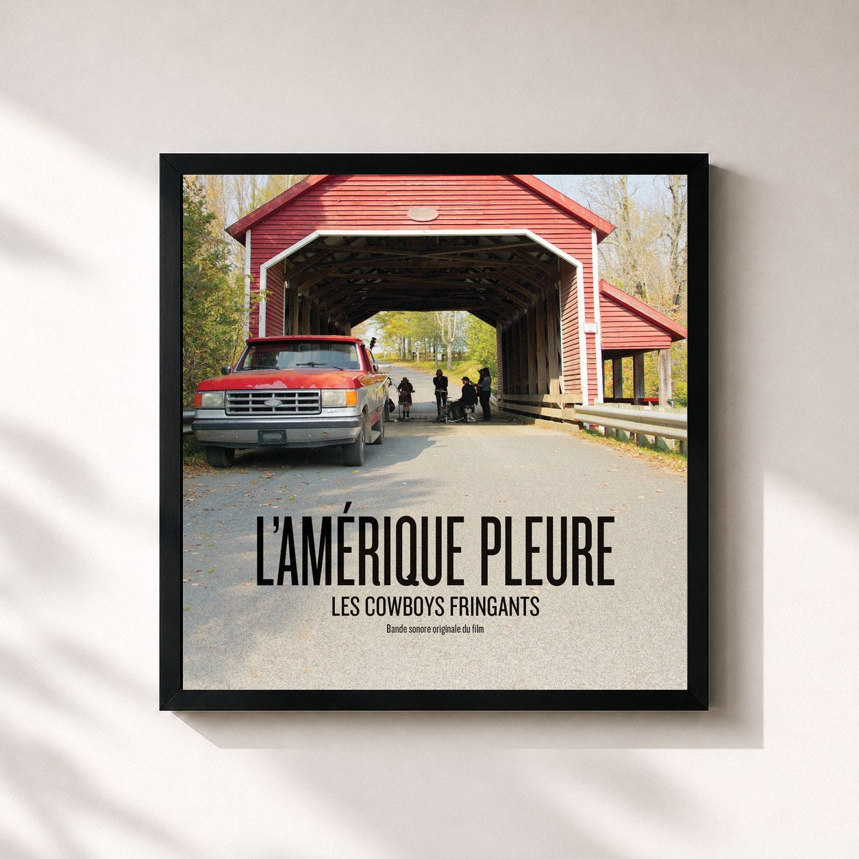 #noir Tableau carré de l'album L'Amérique pleure (Bande sonore originale du film) de Les Cowboys Fringants, cadre noir 32x32 cm