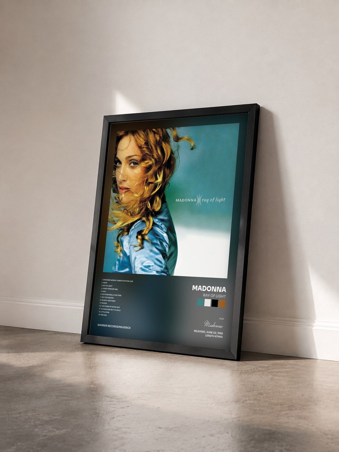 #noir Ray of Light by Madonna as a framed art print seen at an angle, black frame