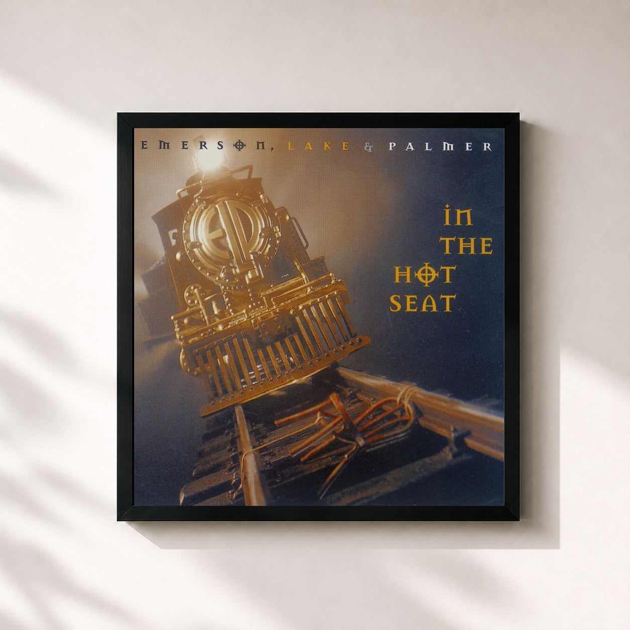 #noir Tableau carré de l'album In The Hot Seat de Emerson, Lake & Palmer, cadre noir 32x32 cm