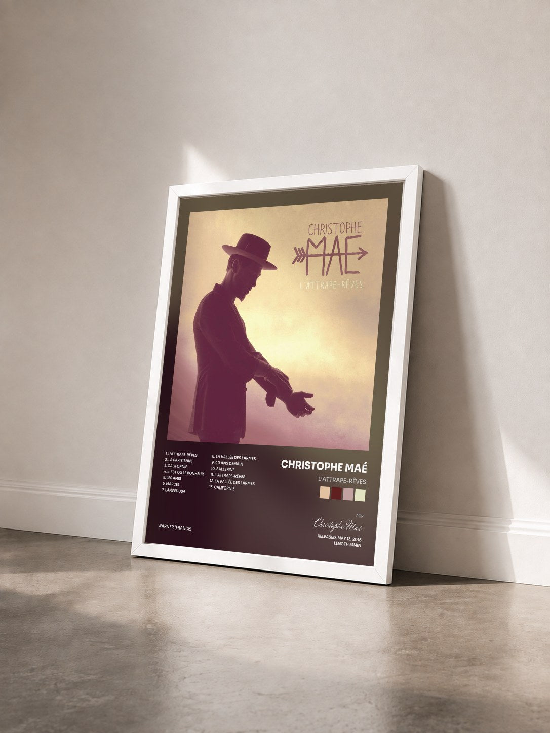 #blanc Tableau de l'album L'attrape-rêves de Christophe Maé vu de trois quarts, cadre blanc