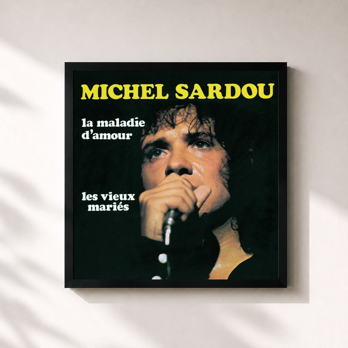 #noir La Maladie D'Amour de Michel Sardou en lámina cuadrada enmarcada, marco negro de 32x32 cm