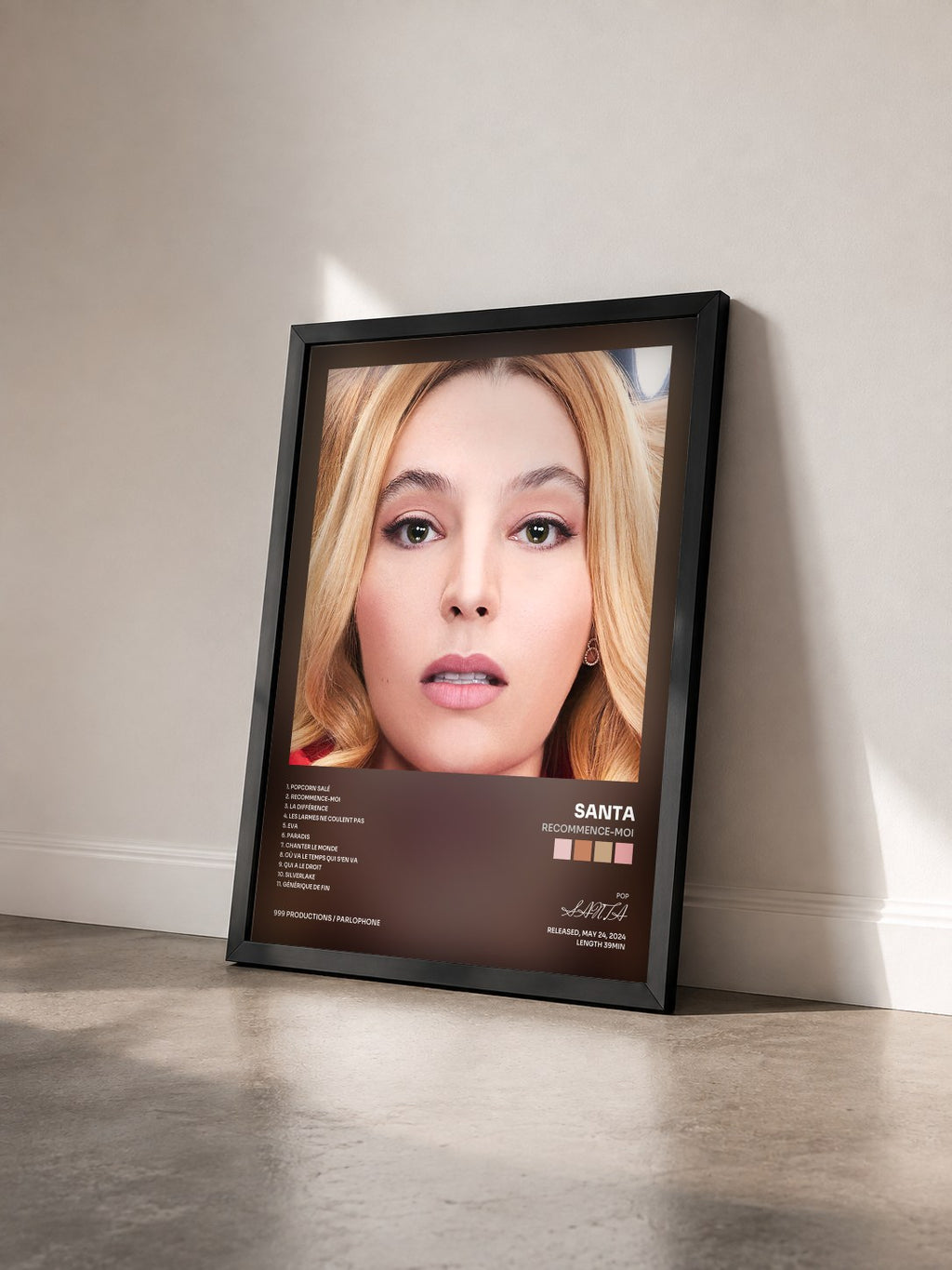 #noir RECOMMENCE-MOI by SANTA as a framed art print seen at an angle, black frame