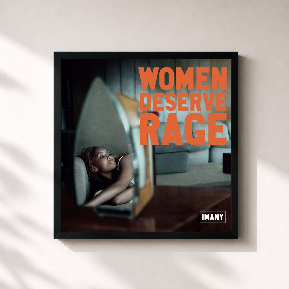 #noir Tableau carré de l'album Women Deserve Rage de Imany, cadre noir 32x32 cm