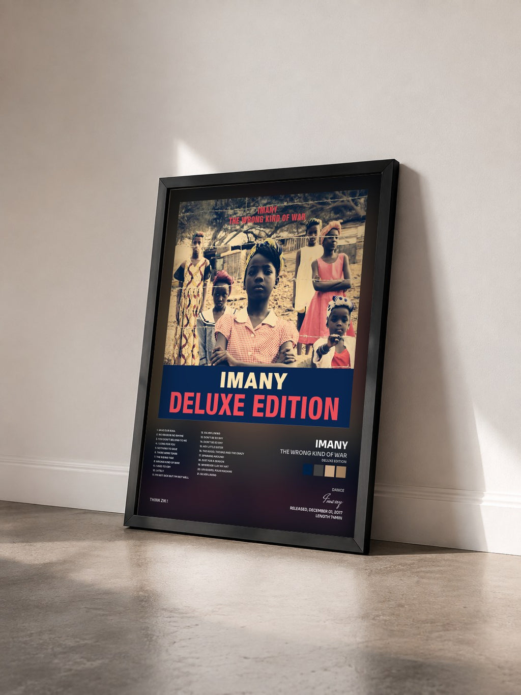 #noir Tableau de l'album The Wrong Kind of War (Deluxe Edition) de Imany vu de trois quarts, cadre noir