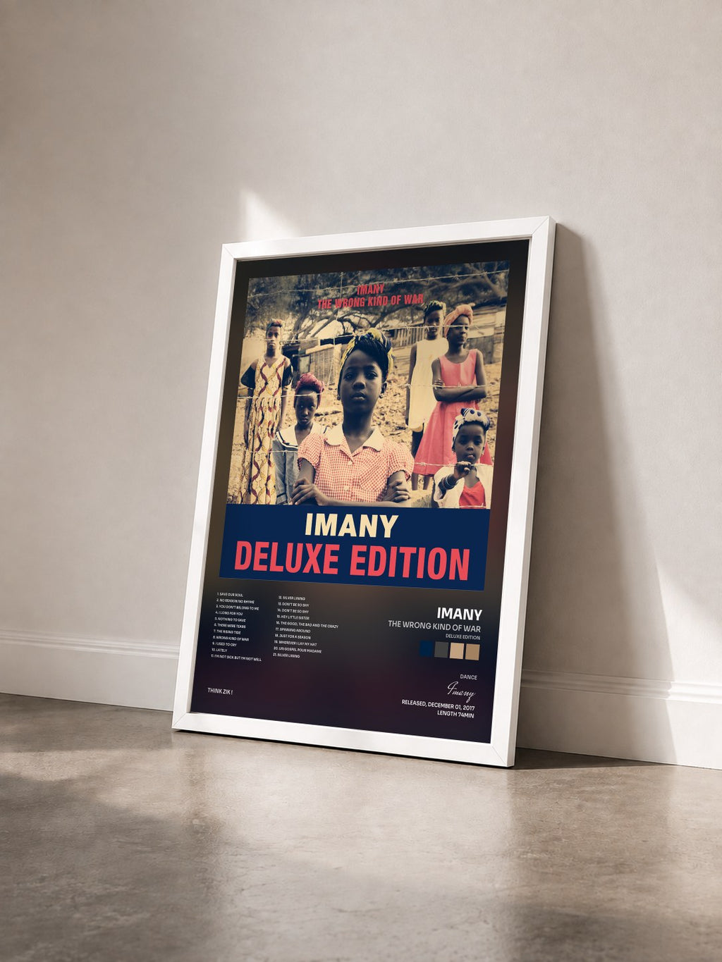 #blanc Tableau de l'album The Wrong Kind of War (Deluxe Edition) de Imany vu de trois quarts, cadre blanc