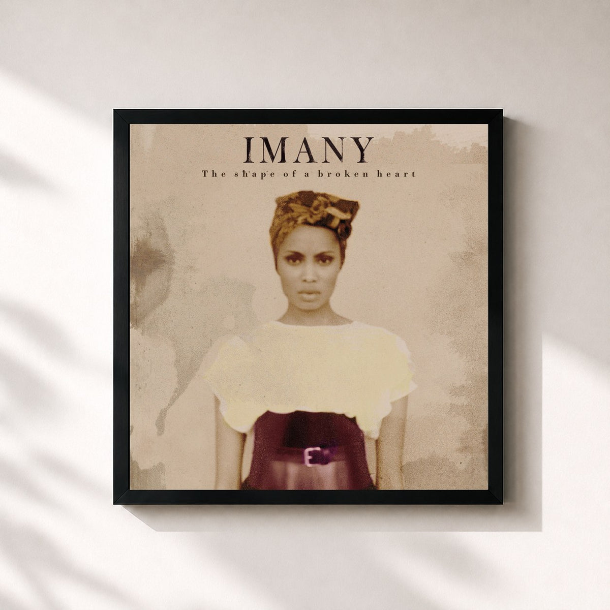 #noir Tableau carré de l'album The Shape of a Broken Heart de Imany, cadre noir 32x32 cm