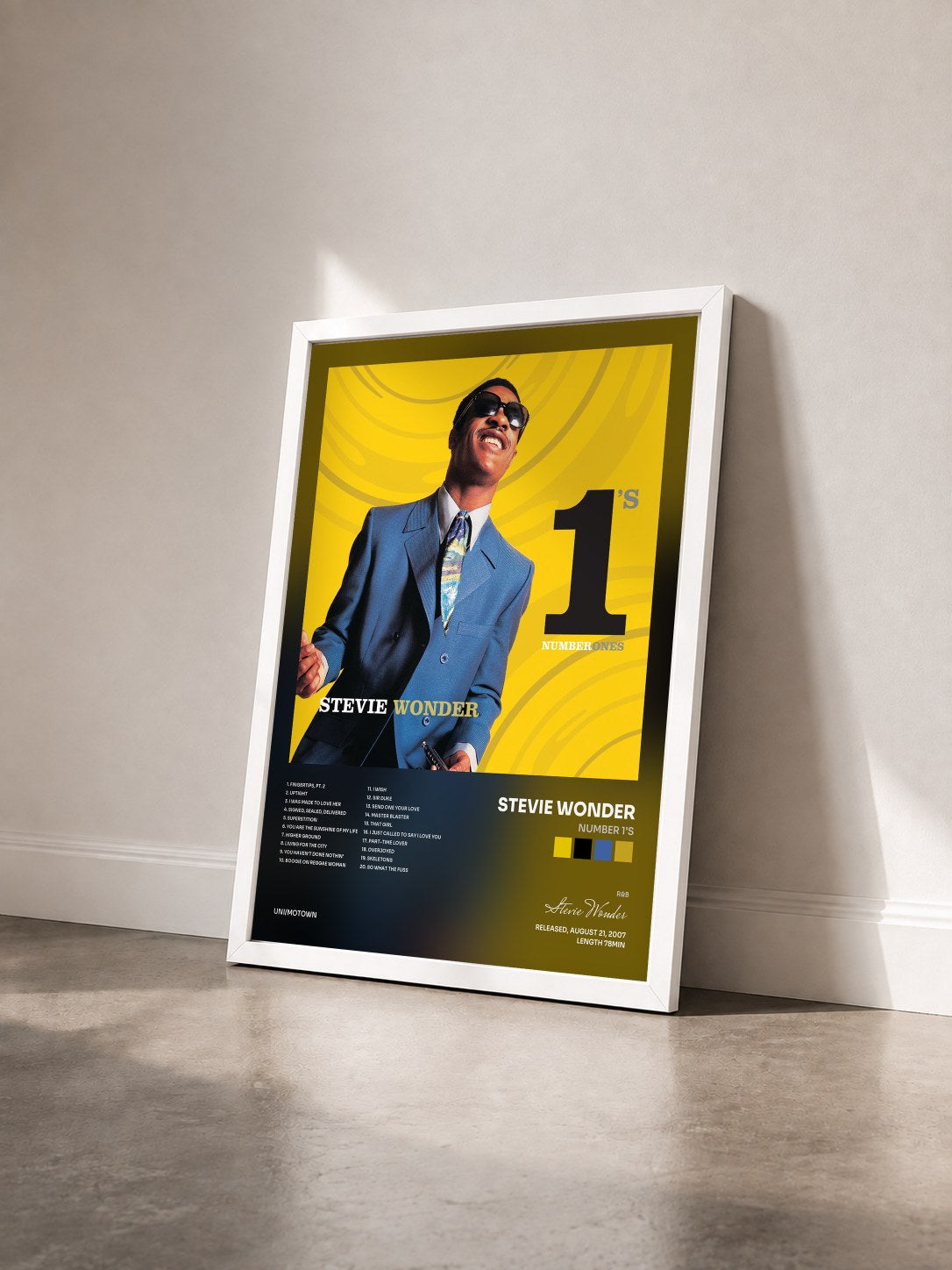 #blanc Tableau de l'album Number 1's de Stevie Wonder vu de trois quarts, cadre blanc