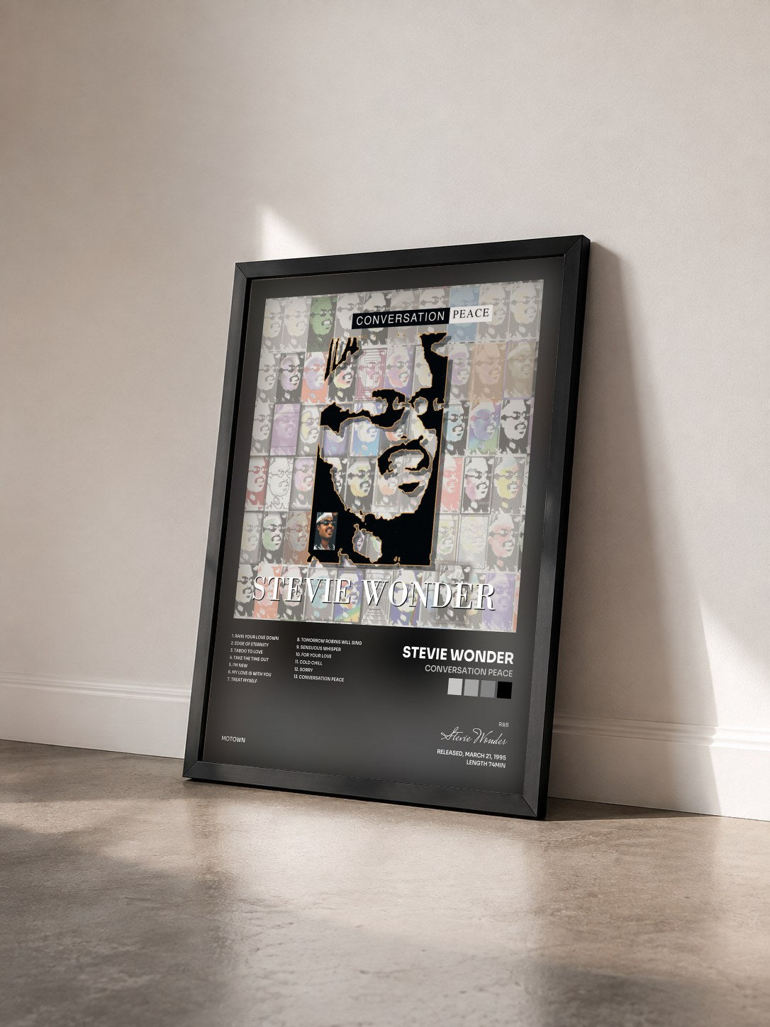 #noir Tableau de l'album Conversation Peace de Stevie Wonder vu de trois quarts, cadre noir