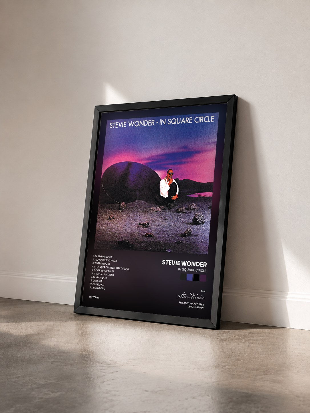 #noir Tableau de l'album In Square Circle de Stevie Wonder vu de trois quarts, cadre noir