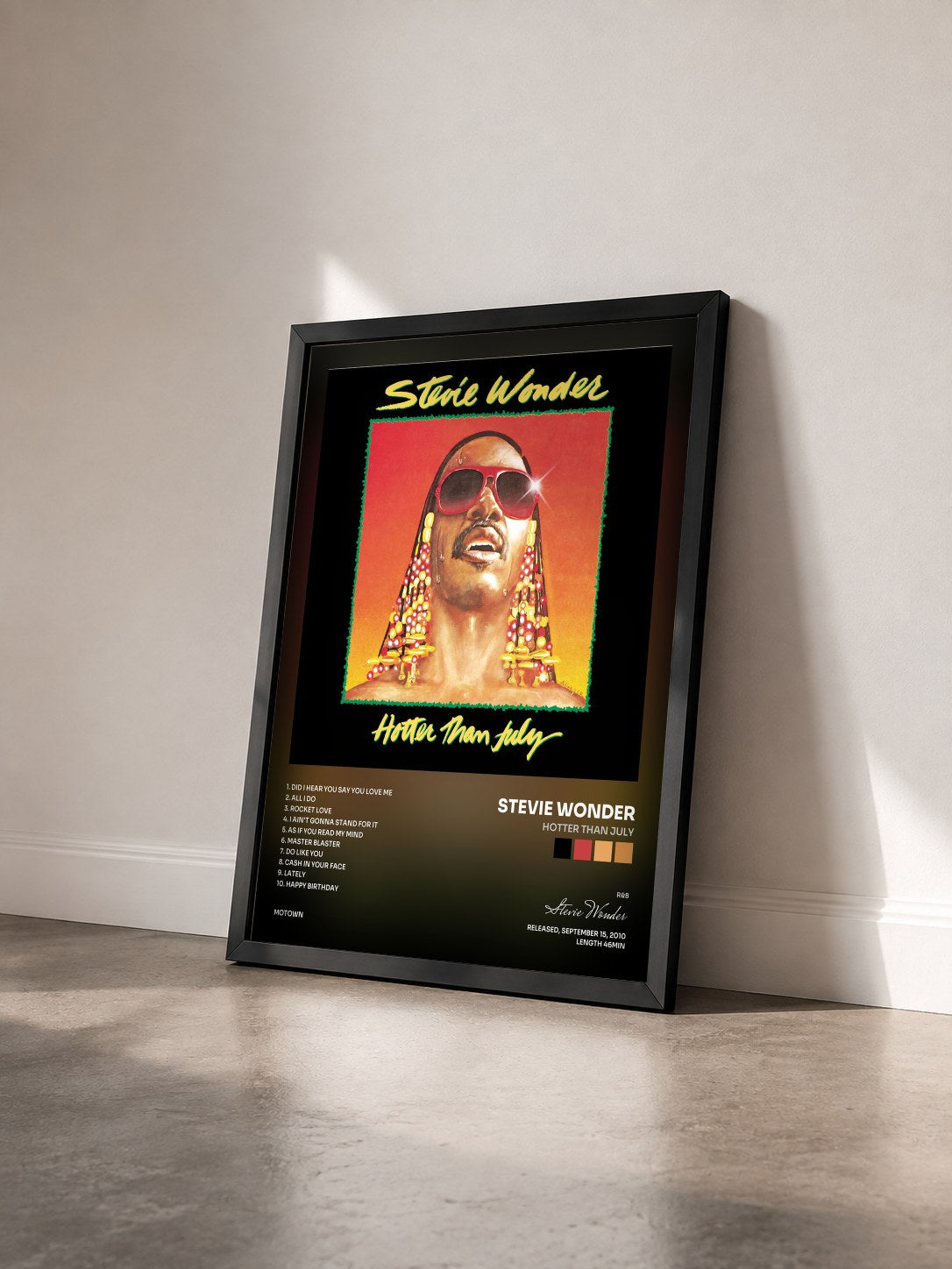 #noir Tableau de l'album Hotter Than July de Stevie Wonder vu de trois quarts, cadre noir