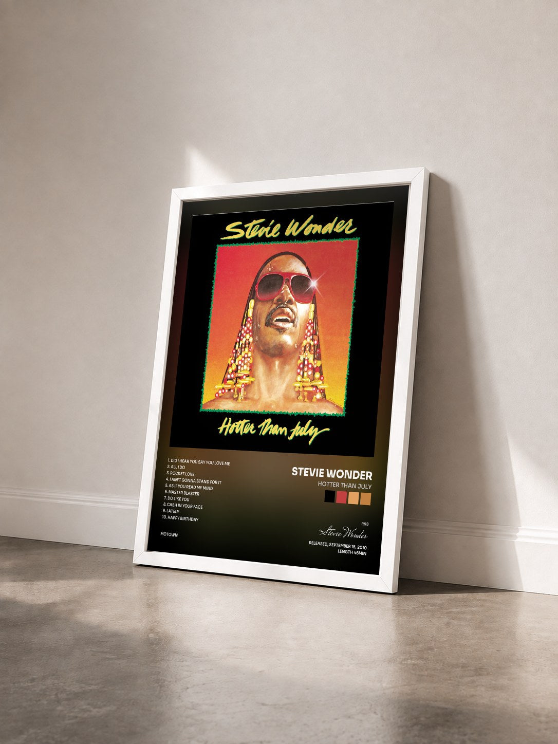 #blanc Tableau de l'album Hotter Than July de Stevie Wonder vu de trois quarts, cadre blanc