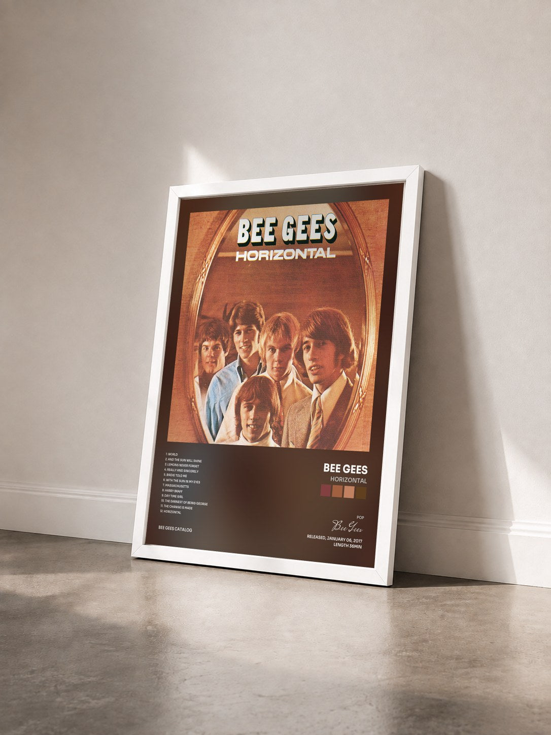 #blanc Tableau de l'album Horizontal de Bee Gees vu de trois quarts, cadre blanc