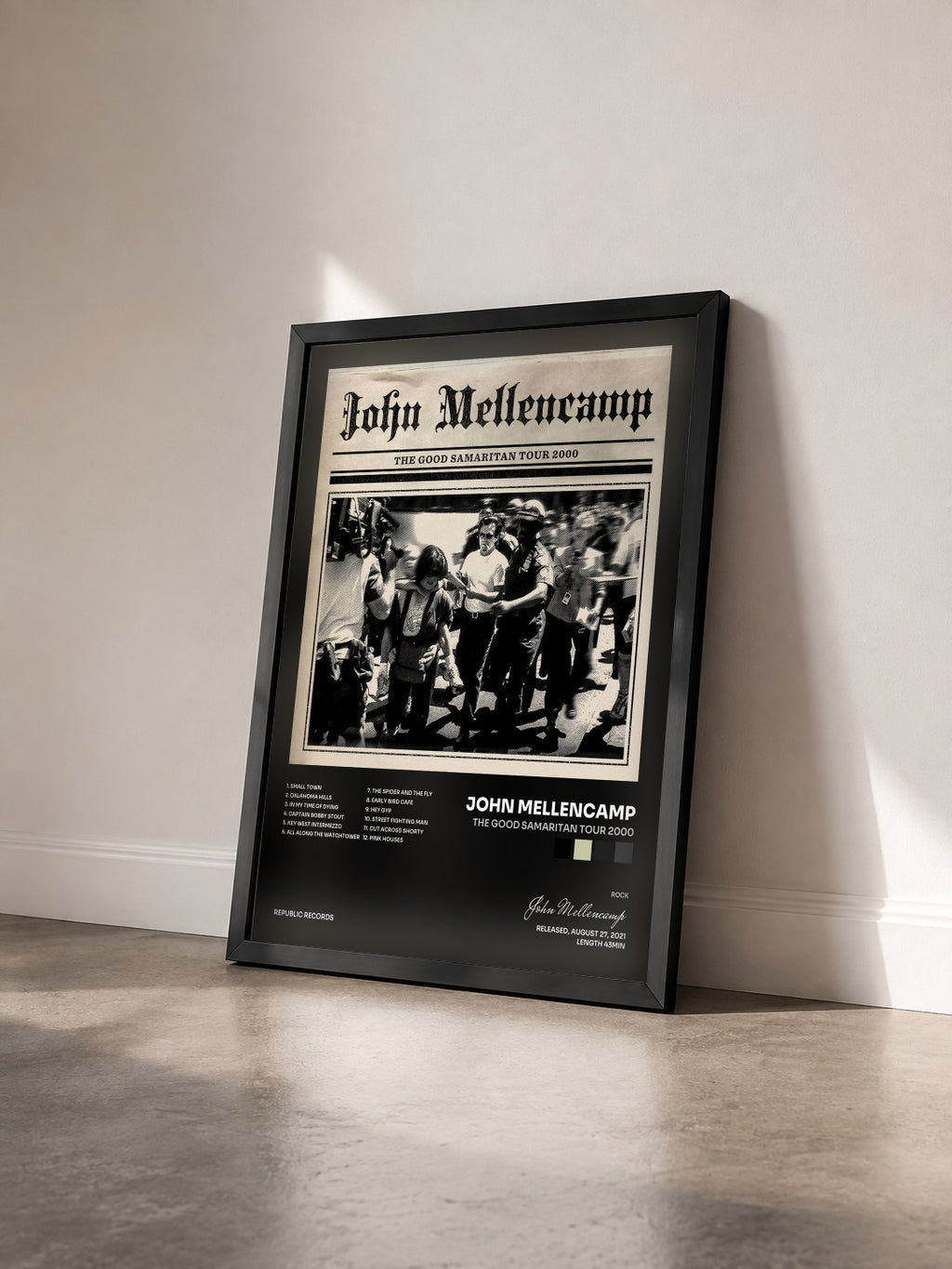#noir The Good Samaritan Tour 2000 by John Mellencamp as a framed art print seen at an angle, black frame