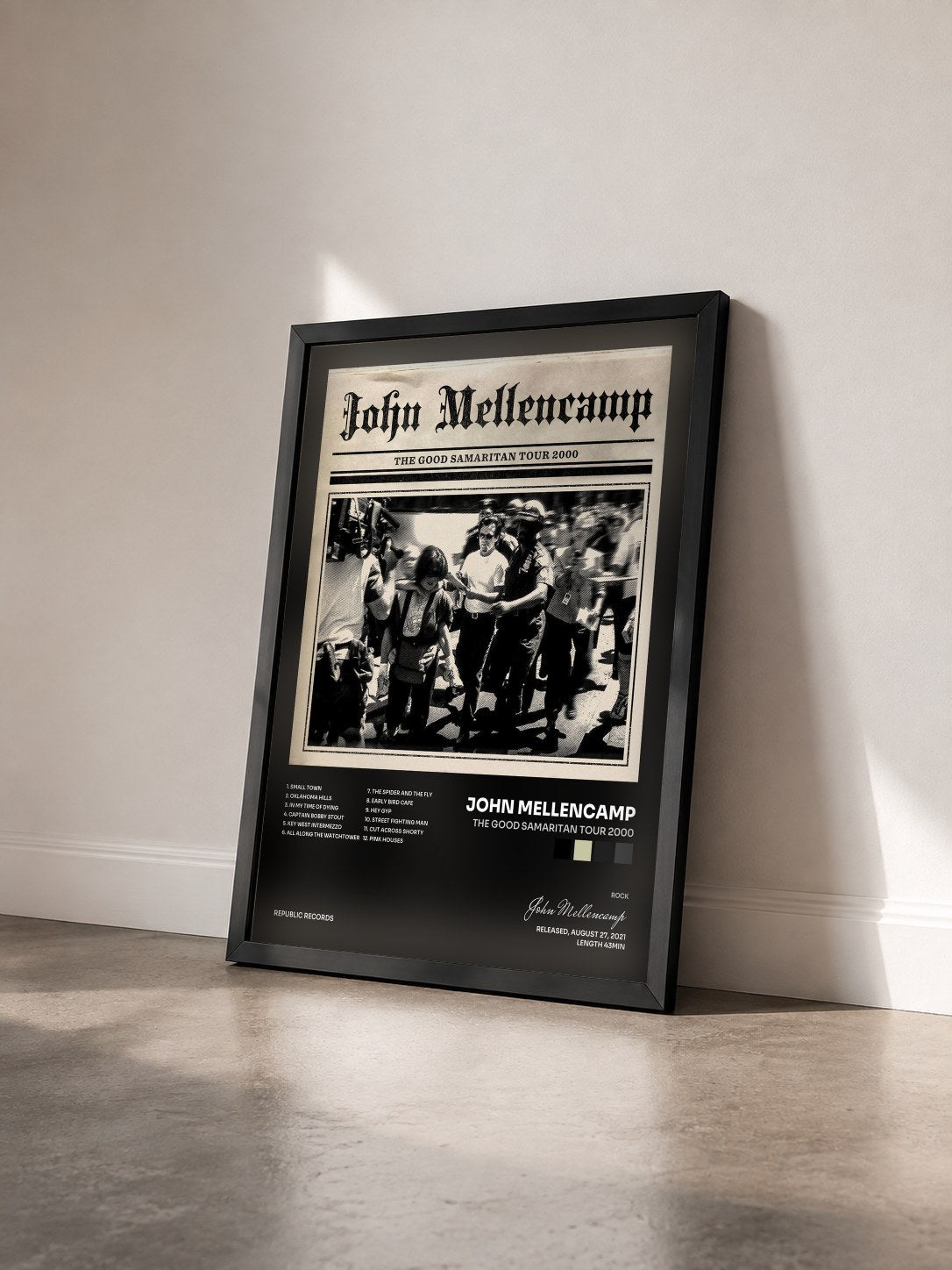 #noir The Good Samaritan Tour 2000 by John Mellencamp as a framed art print seen at an angle, black frame