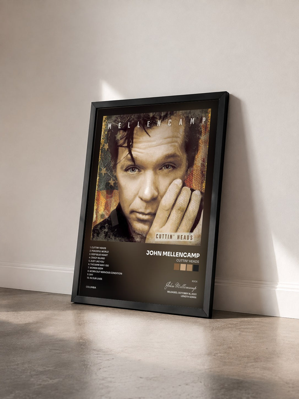 #noir Cuttin' Heads von John Mellencamp als gerahmter Kunstdruck von schräg gesehen, schwarzer Rahmen