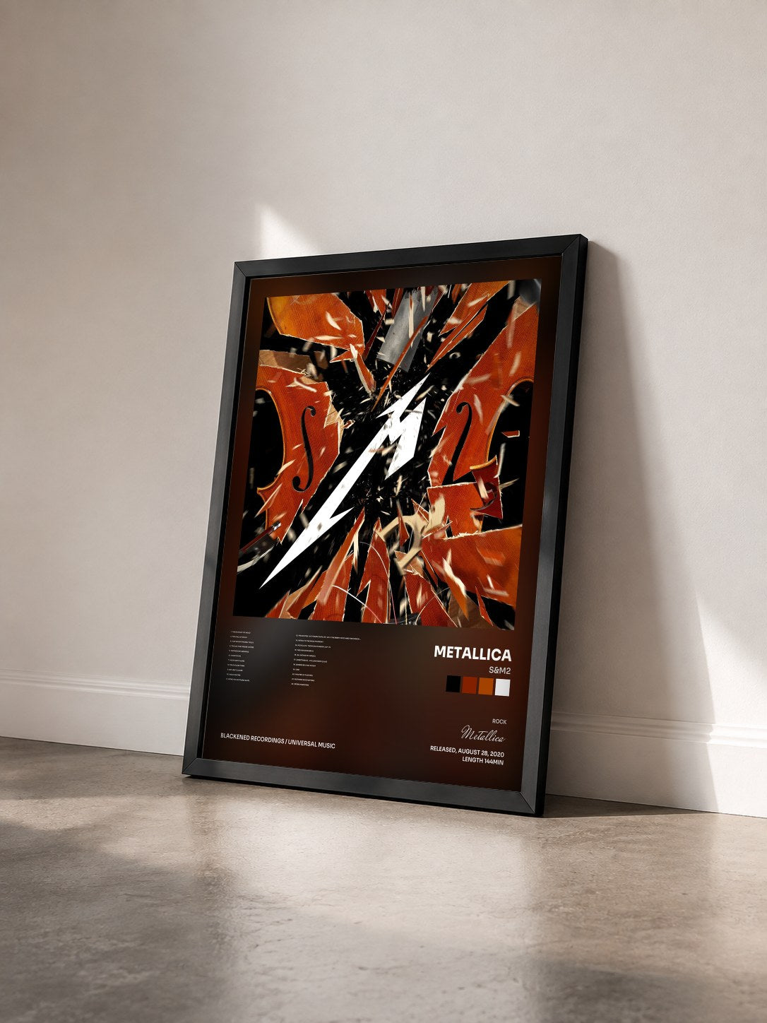 #noir Tableau de l'album S&M2 de Metallica vu de trois quarts, cadre noir