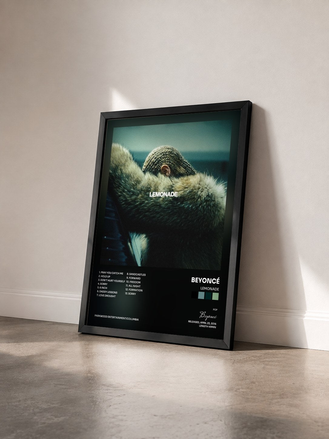 #noir Lemonade by Beyoncé as a framed art print seen at an angle, black frame