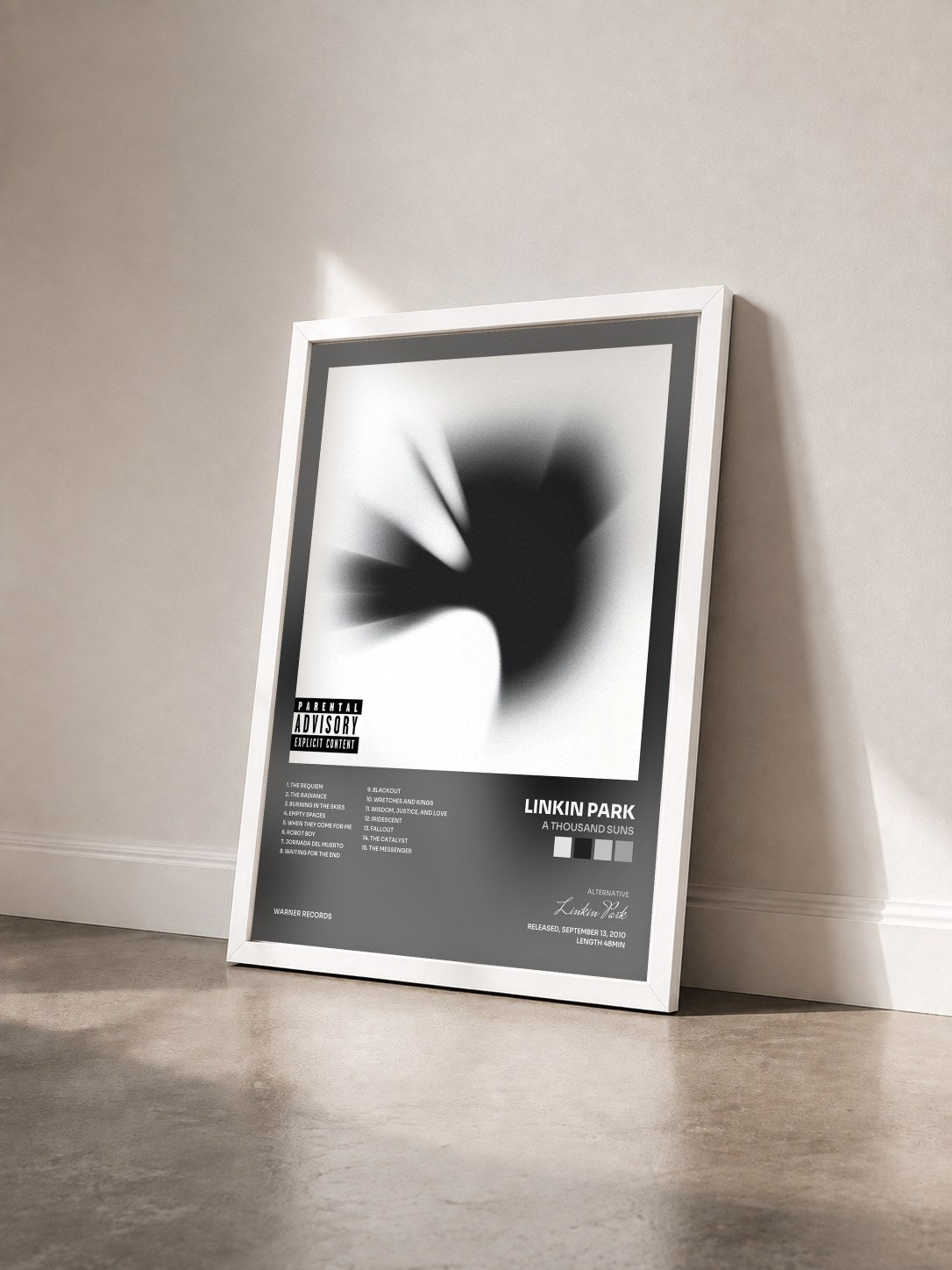 #blanc A Thousand Suns by Linkin Park as a framed art print seen at an angle, white frame