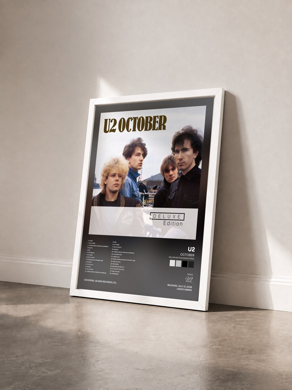 #blanc Tableau de l'album October (Deluxe Edition Remastered) de U2 vu de trois quarts, cadre blanc