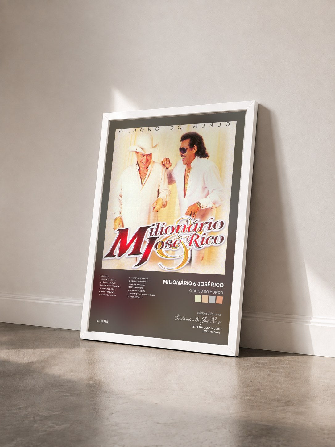 #blanc Tableau de l'album O Dono do Mundo de Milionário & José Rico vu de trois quarts, cadre blanc