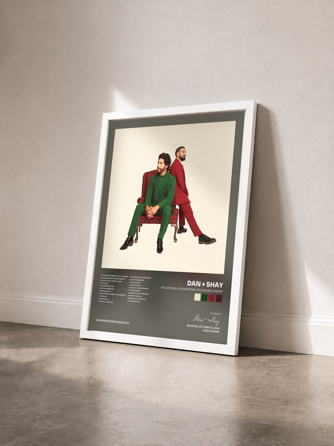 #blanc Tableau de l'album It's Officially Christmas: The Double Album de Dan + Shay vu de trois quarts, cadre blanc