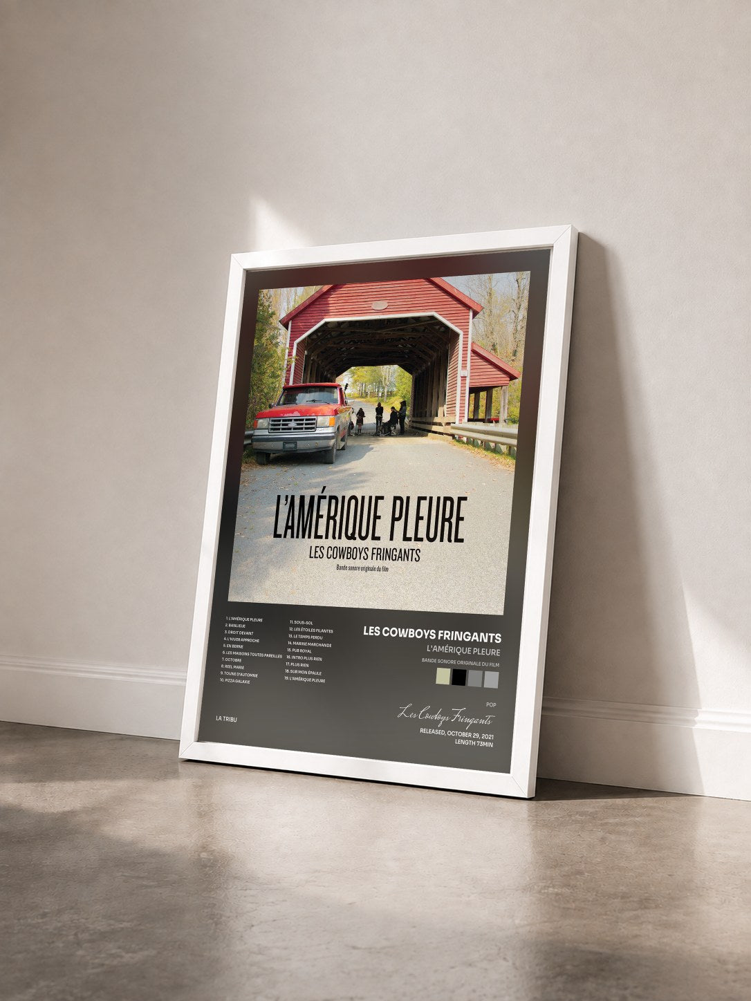 #blanc Tableau de l'album L'Amérique pleure (Bande sonore originale du film) de Les Cowboys Fringants vu de trois quarts, cadre blanc