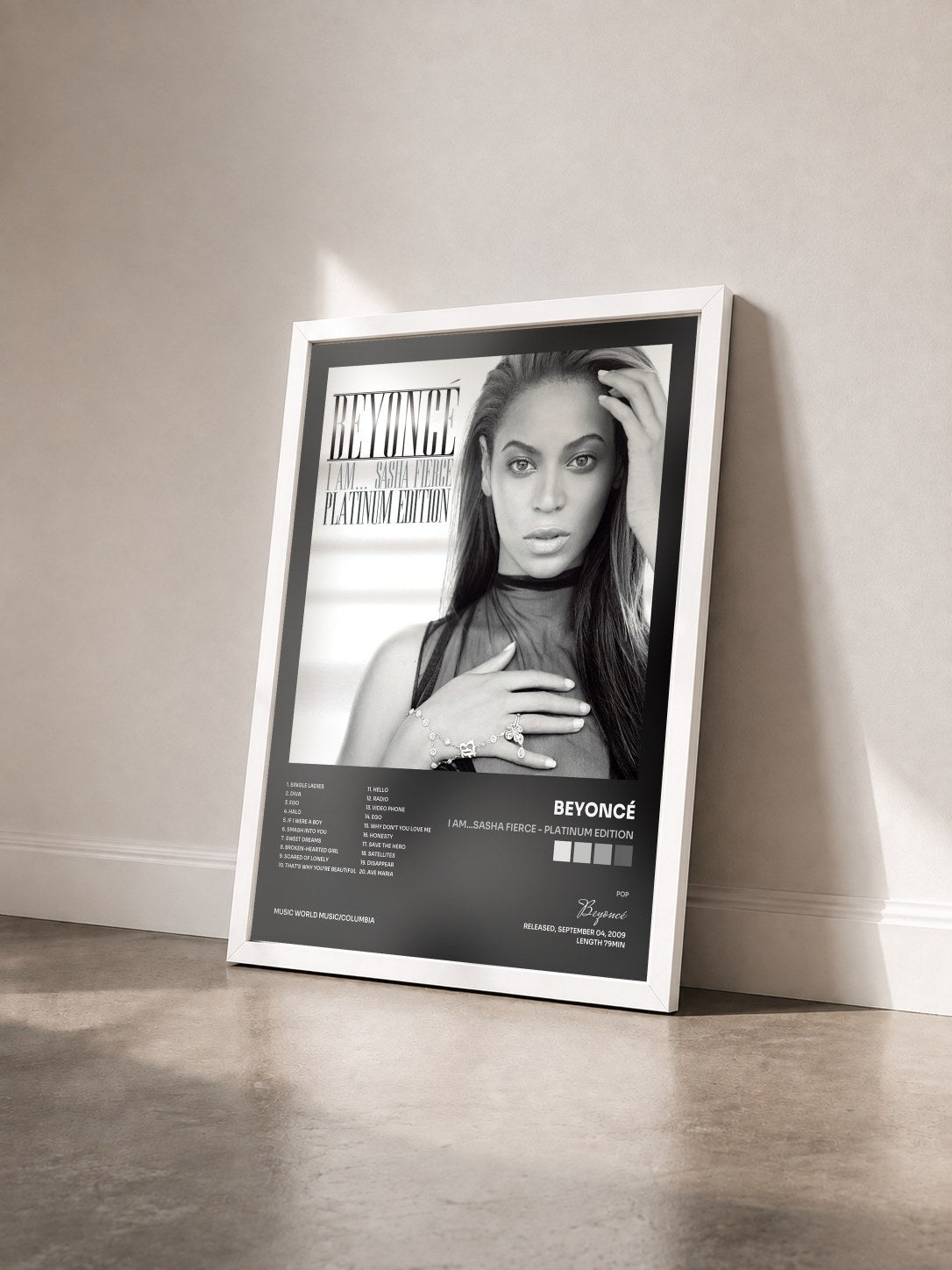 #blanc Tableau de l'album I AM...SASHA FIERCE - Platinum Edition de Beyoncé vu de trois quarts, cadre blanc