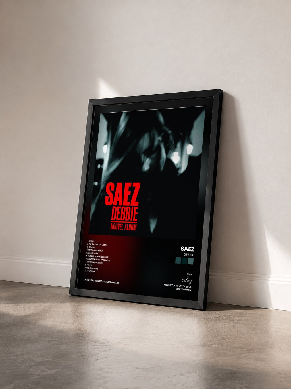 #noir Tableau de l'album Debbie de Saez vu de trois quarts, cadre noir